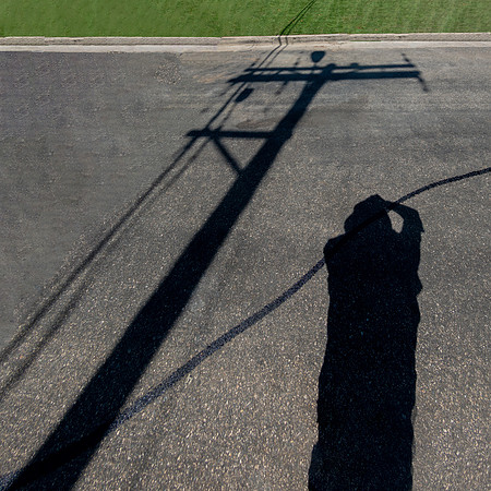 PHOTOGRAPHER AND THE POWER POLE