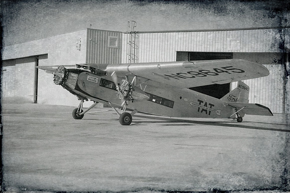 TRIMOTOR OUTSIDE HANGAR