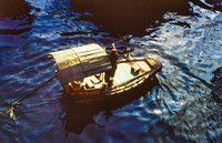 SINGLE BOAT ON IN KOWLOON
