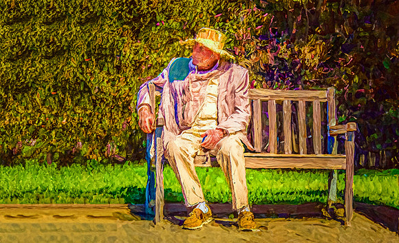 OLD MAN WITH HAT ON BENCH