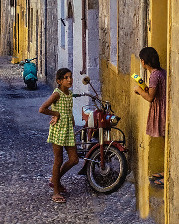 TWO GIRLS AND A MOTORBIKE